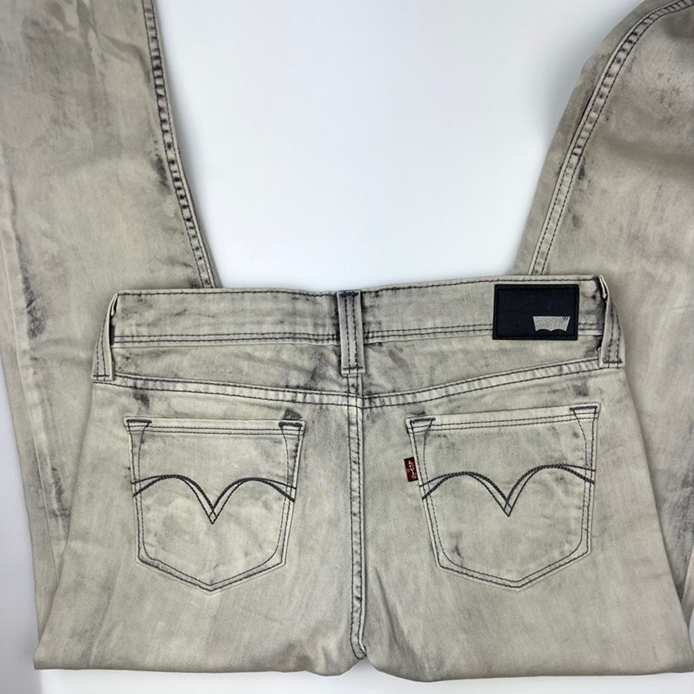 Levi’s “Foggy Memory” Distressed low rise skinny jeans